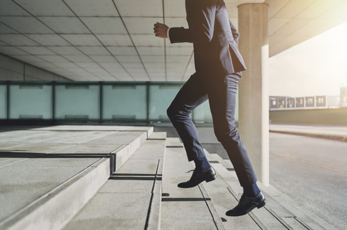 Employee Running Up Steps
